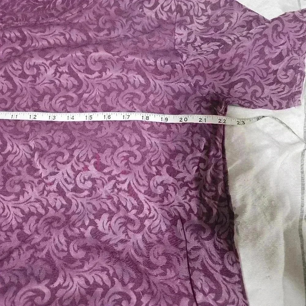 Cut loose purple blouse!